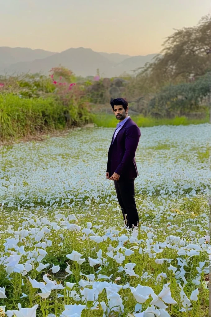 sendhil ramamurthy a man incredible portrait, field of paper flowers, evanescence, gorgeous lighting sad