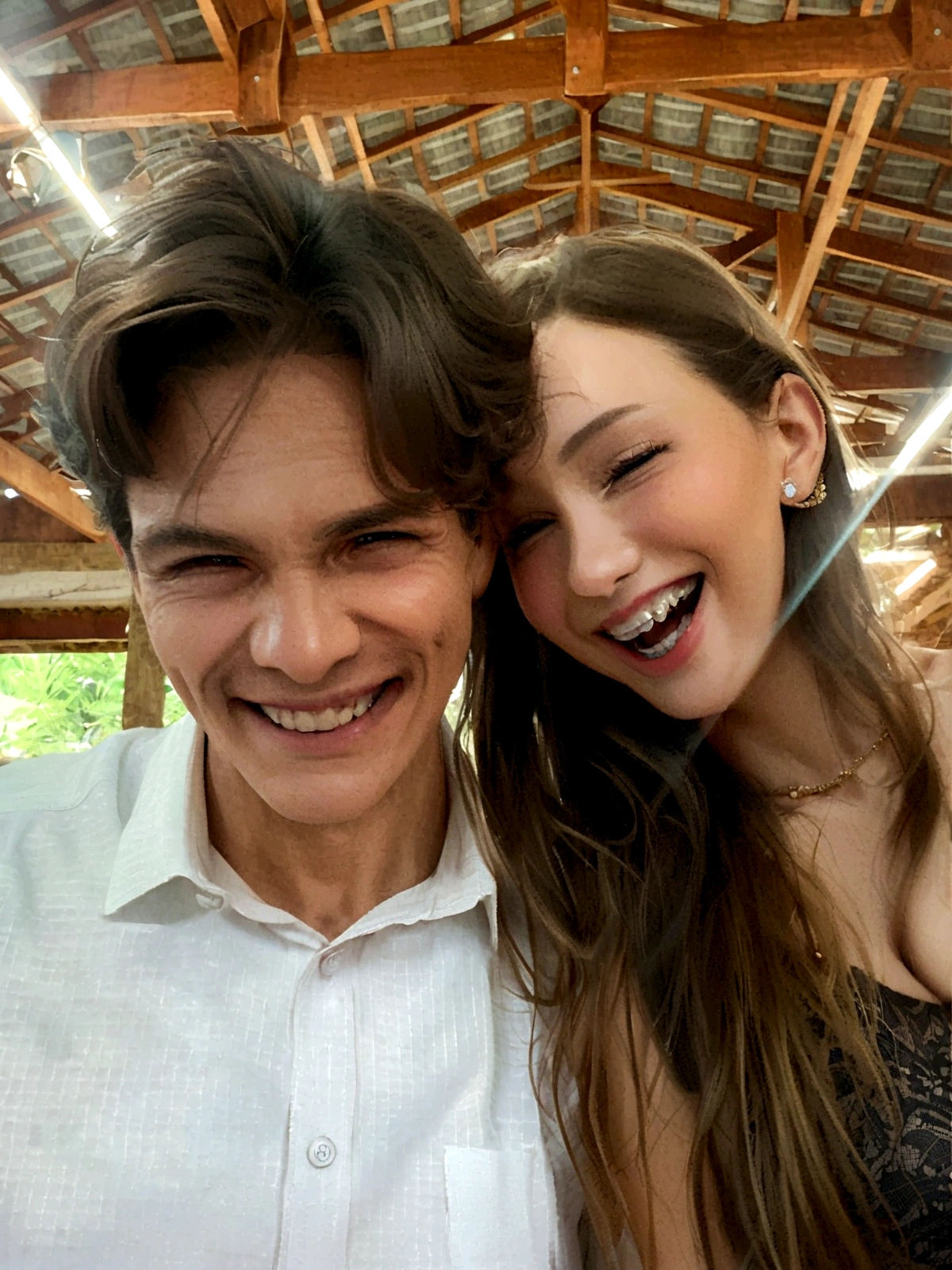 a smiling man and woman