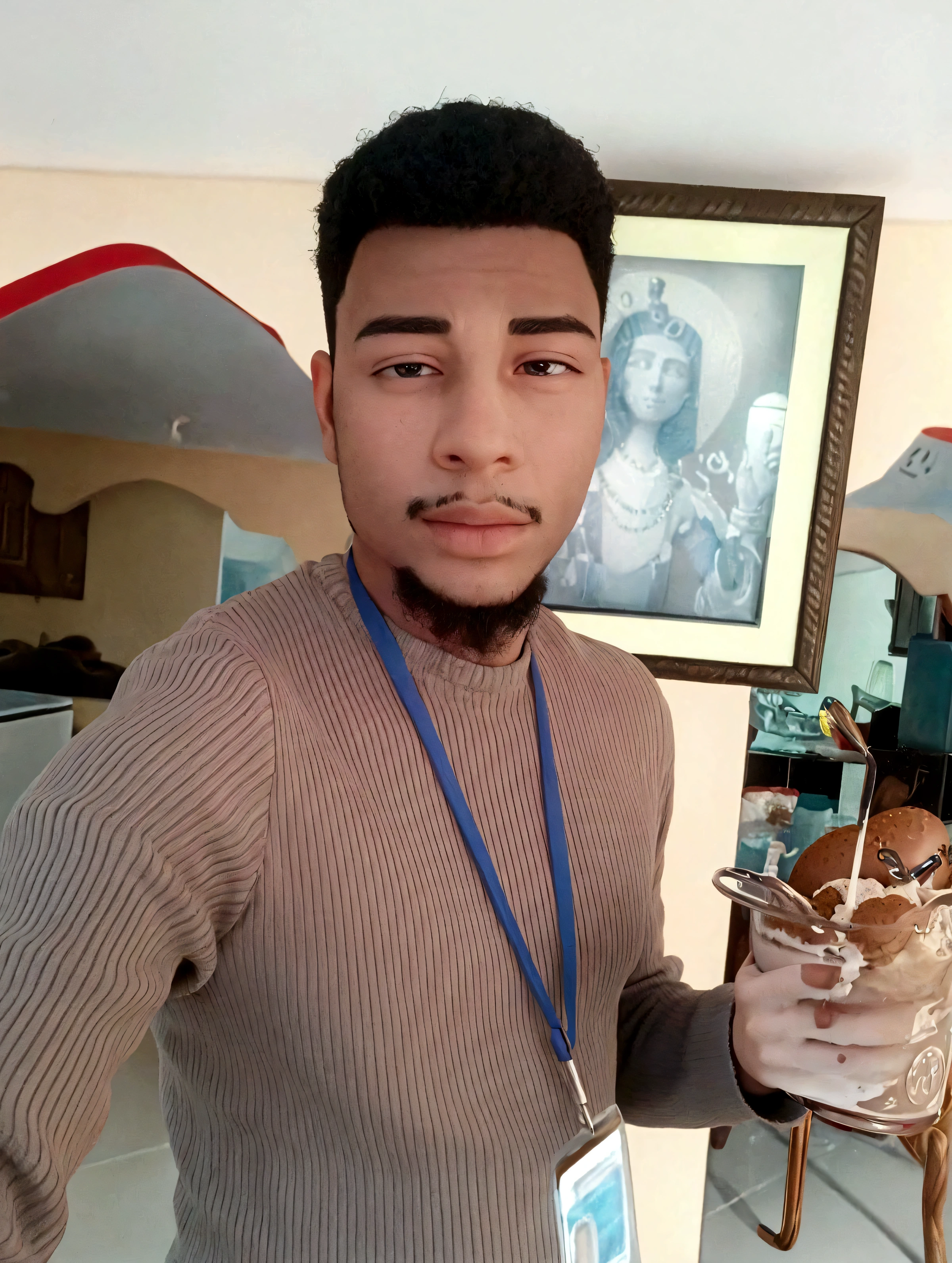 There is a man holding a glass of ice cream and a donut, taken in the early 2020s, around 19 years, ray tracing, profile pictureture, 27 years old, profile picture, 23 years, wears an egyptian ankh necklace, profile picture, illuminated from one side, he is about 2 
