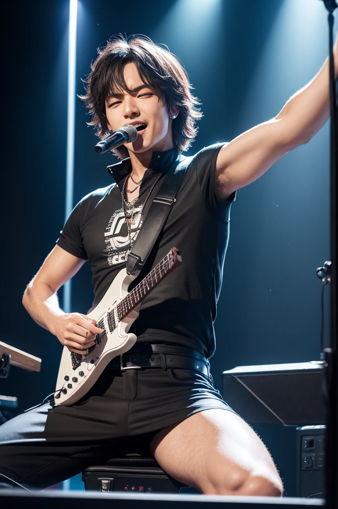 Male rock keyboardist in a show