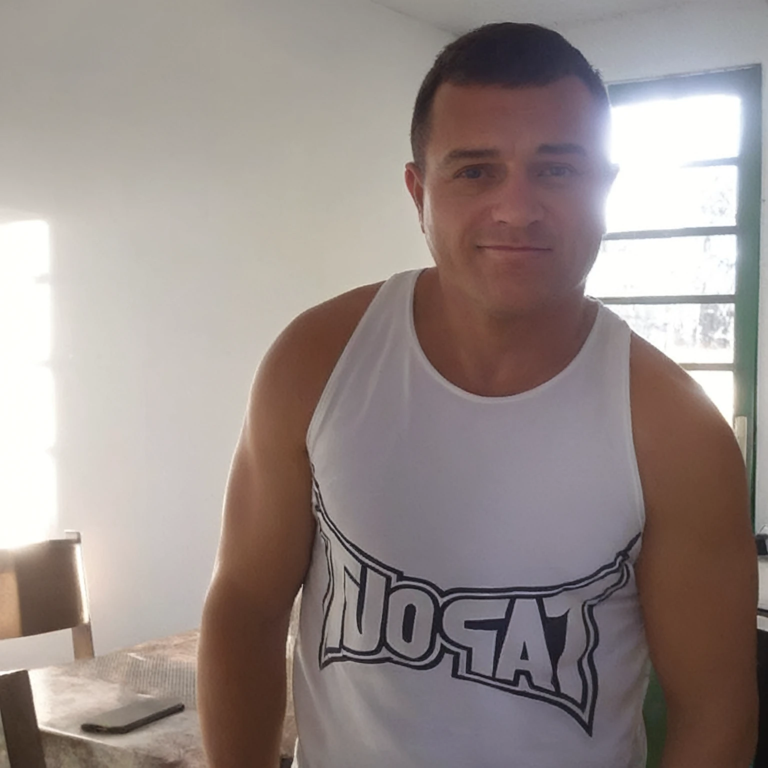 a close-up of a man, full face coverage, symmetrical face, ((do not alter the image)), realistic image, do not alter the image, dressed, (realistic photo:1.4), (hyper-realistic:1.4), (realistic : 1.3), (softer lighting: 1.05), (increase cinematic lighting quality: 0.9), 32K, realistic lighting, backlight, face light, ray trace, (bright light: 1.2), (increase quality: 1.4), (best quality real texture skin: 1.4), finely detailed eyes, finely detailed face, fine quality eyes, (increase skin texture beauty: 1.1