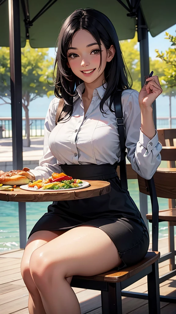 Beautiful black-haired woman sitting at a table and laughing at delicious-looking food