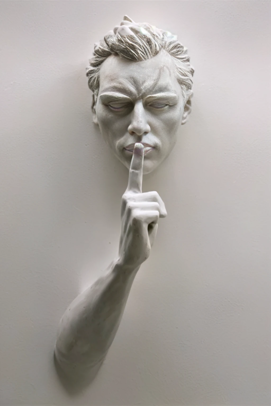 a close up of a sculpture of a person with a finger on his lips, give your mouth, don&#39;t speak badly, with the finger pointing, silence, hand on the cheek, sculpture, thinker, clay sculpture, funny sculpture, sculptor, Mauricio Cattelan, solemn gesture, hypperrealistic 3 d sculpture, by David Begbie, dramatic work of art, by Thierry Bisch