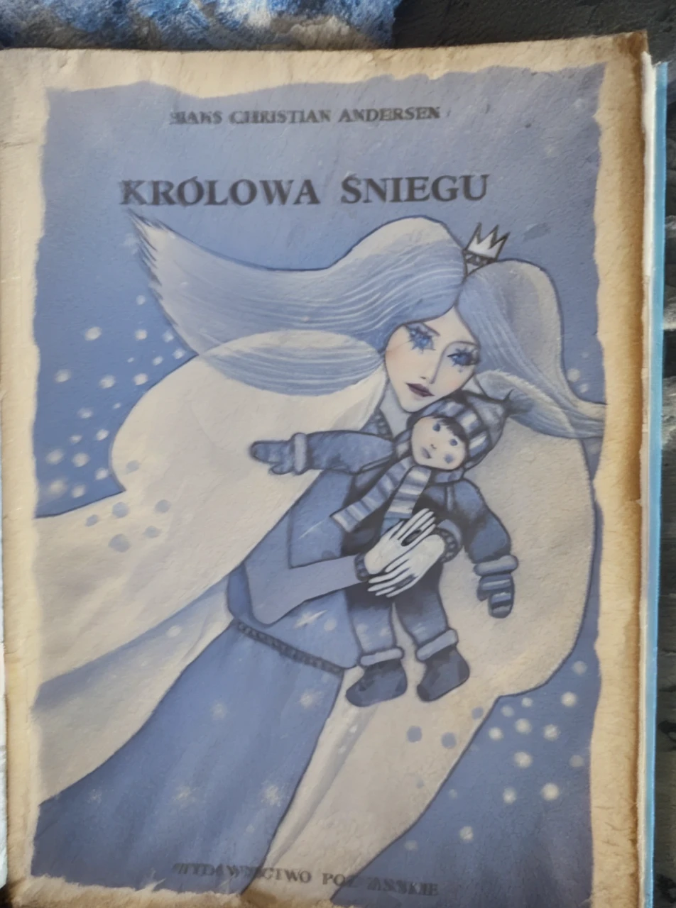 The Snow Queen fairytale , snow queen in white soft fox fur coat, real snow queen, snow queen hug  in fur coat  wrapped around her fur 