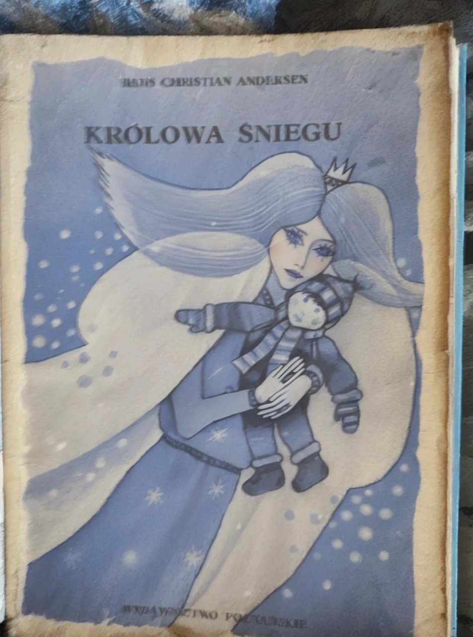 The Snow Queen fairytale , snow queen in white soft fox fur coat, real snow queen, snow queen hug  in fur coat  wrapped around her fur 
