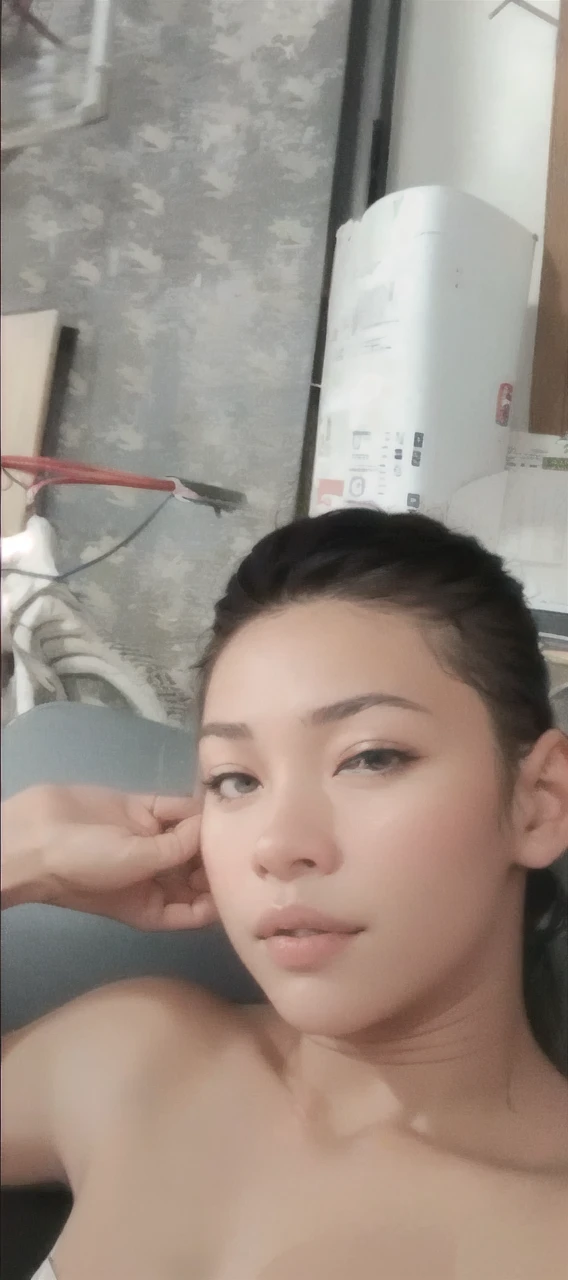 (masterpiece, best quality, highres, high resolution:1.2), extremely detailed, realistic, intricate details, Noemi, beautiful 27 year old Filipino woman, , Filipino, black wavy hair, classroom, sitting on desk, smiling, gym shorts and a school tee shirt and a visor, (in basketball gym:1.3), sfangle,