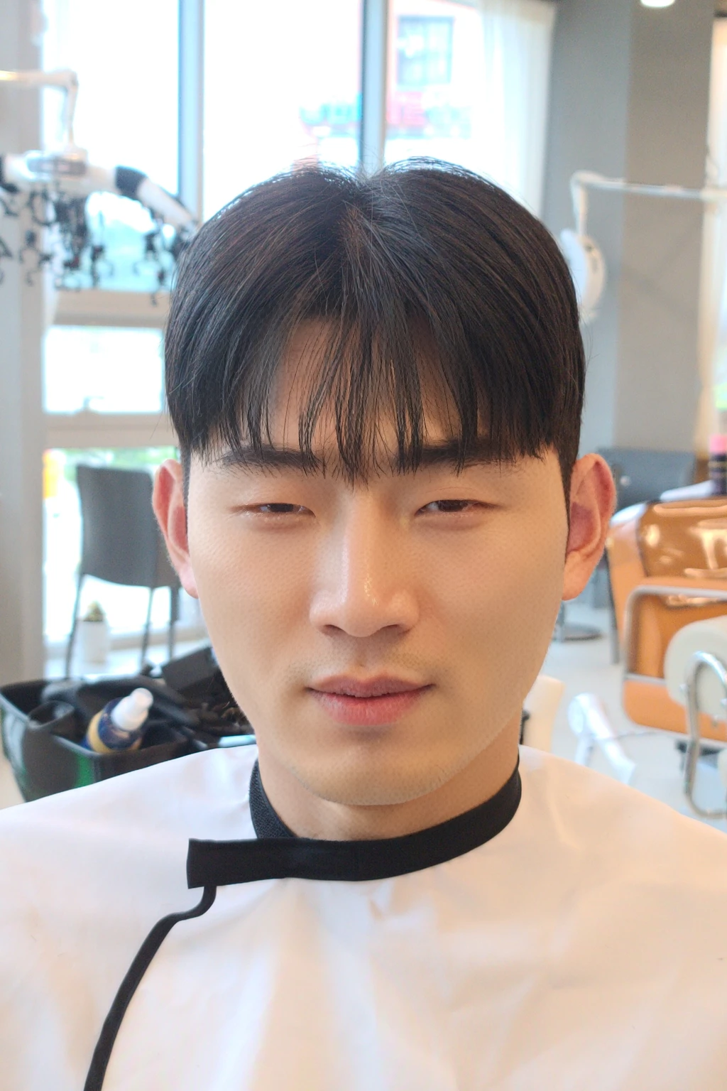 Best Quality, 8k, Masterpiece, (Portrait: 1.3), (photo realistic:1.4), (hyper realistic:1.4), Sharp Focus, looking at viewer, (smoother lighting:1.1), (increase cinematic lighting quality:0.9), realistic lighting, backlighting, light on face, ray trace, (brightening light:1.2), (Increase quality:1.4), sharp detail, (best quality real texture skin:1.4), finely detailed eyes, black_eyes, finely detailed face, 25 year old Korean man
