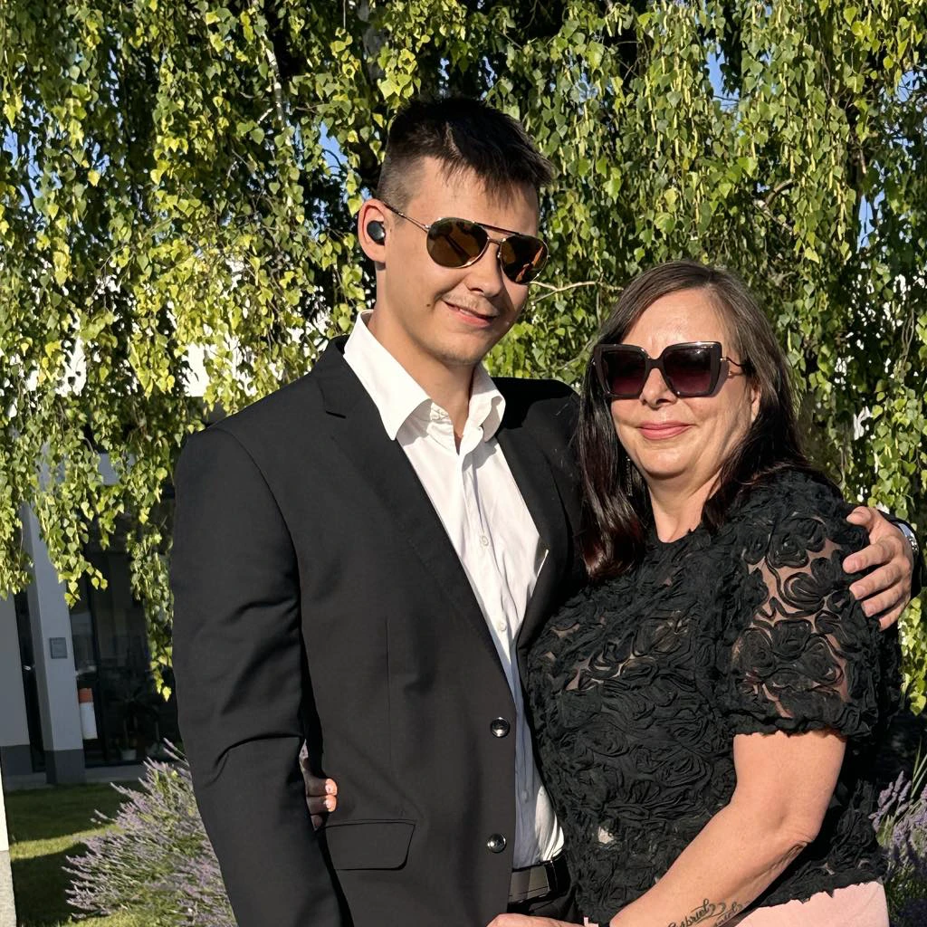 place the woman's left hand next to the woman's body