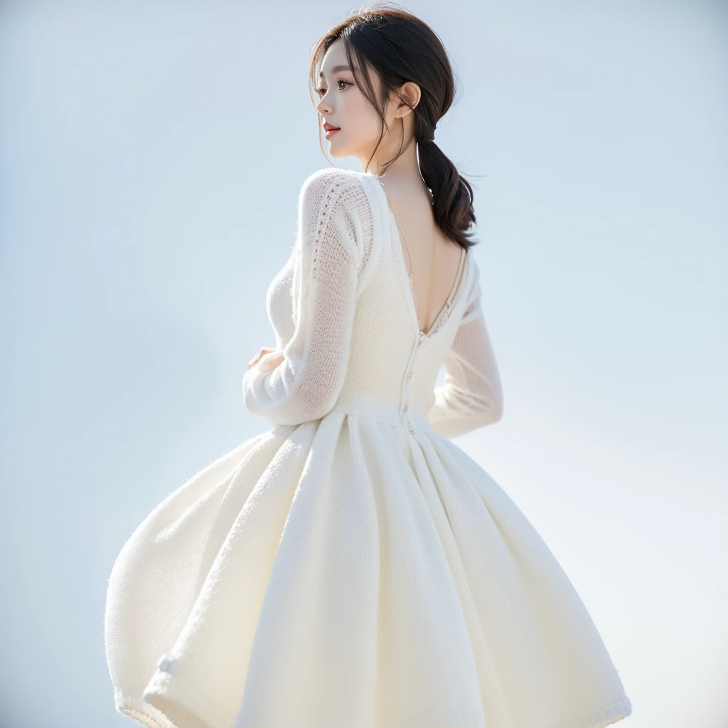 Looking back。woman. Wearing a white knitted dress。Background is white。