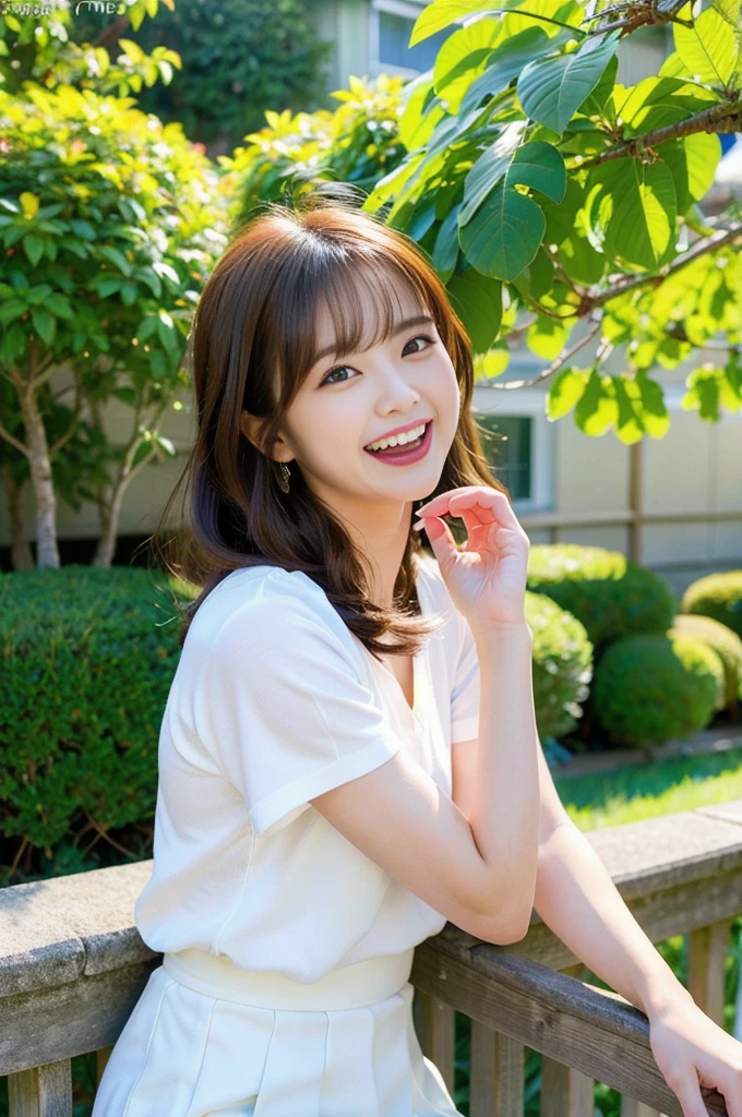 Laughing woman sitting on park bench in white shirt