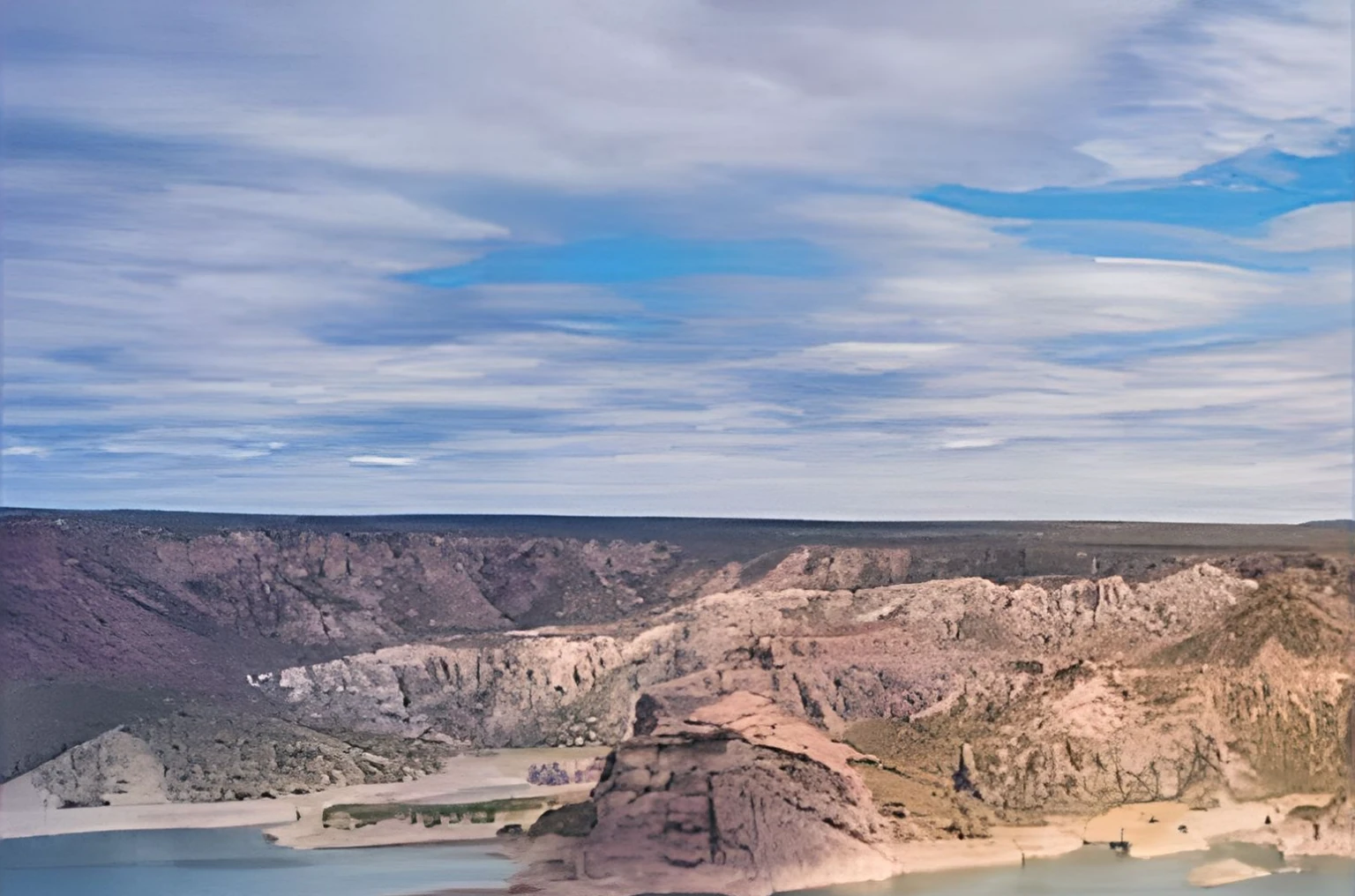 Realistic and detailed image of Lake Atuel in Mendoza, argentina, on a bright day with some white clouds over the blue sky