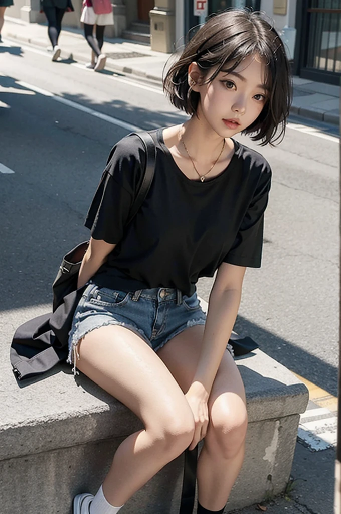 A girl in very short shorts on the street with a black top