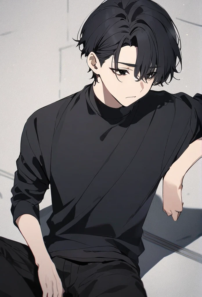 guy, black hair, very short hair, black eyes, black sweatshirt, black pants, sitting on the floor
