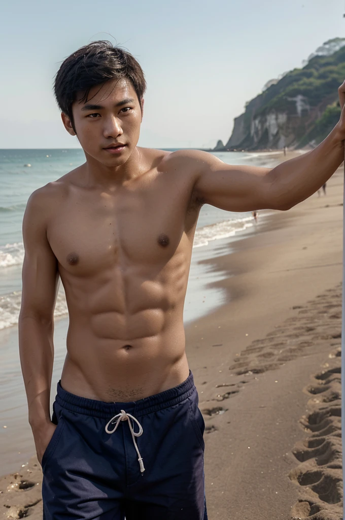 a Chinese (boy) handsome ager aged 17 years with a Brown skin and good abs at beach
