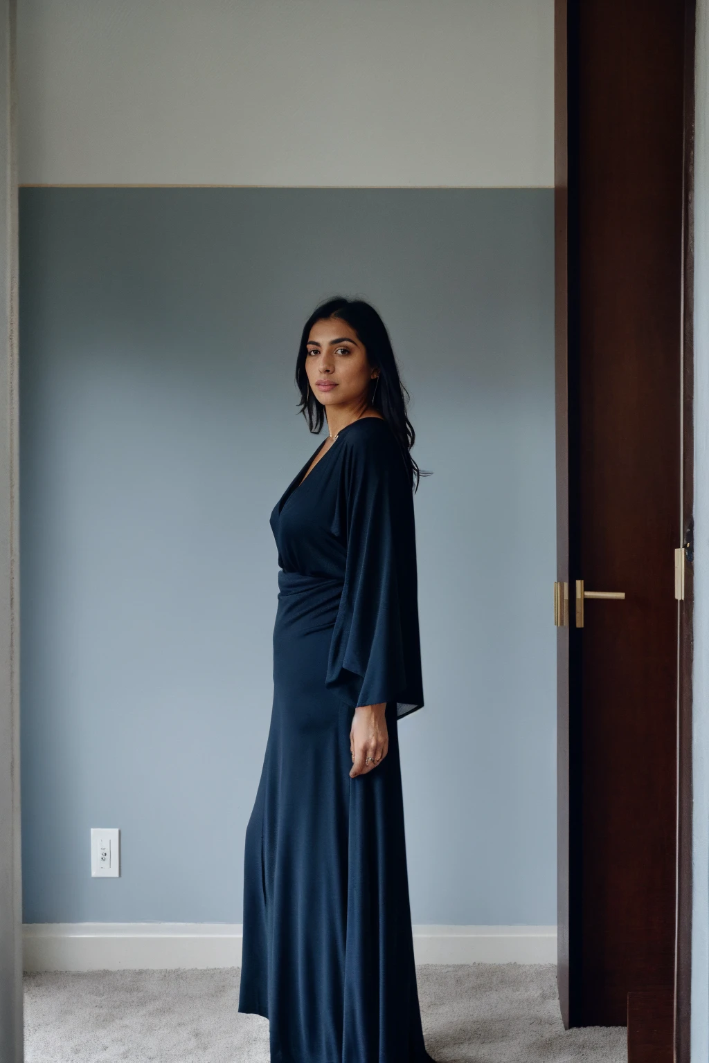 RAW photo,dark,moody,hazy atmosphere,35mm focal lenght,underexposed,cold,candid photograph,artistic,full body,photo of a beautiful,high-society,rich,elegant,30yo Iranian woman,detailed skin,naked,Kaftan, looking at viewer, thick body structure,grey background,no background, candid pose,dim room,blue light, film grain, kodak color, instagram LUT