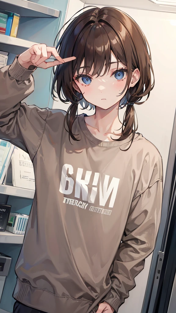 Boy with brown hair wearing gray sweatshirt