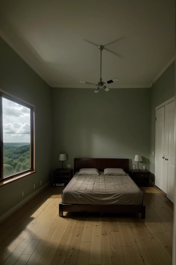 A room with a fairly large room with a mattress and a large window overlooking the view of the forest , . the atmosphere is a little dark and cloudy.