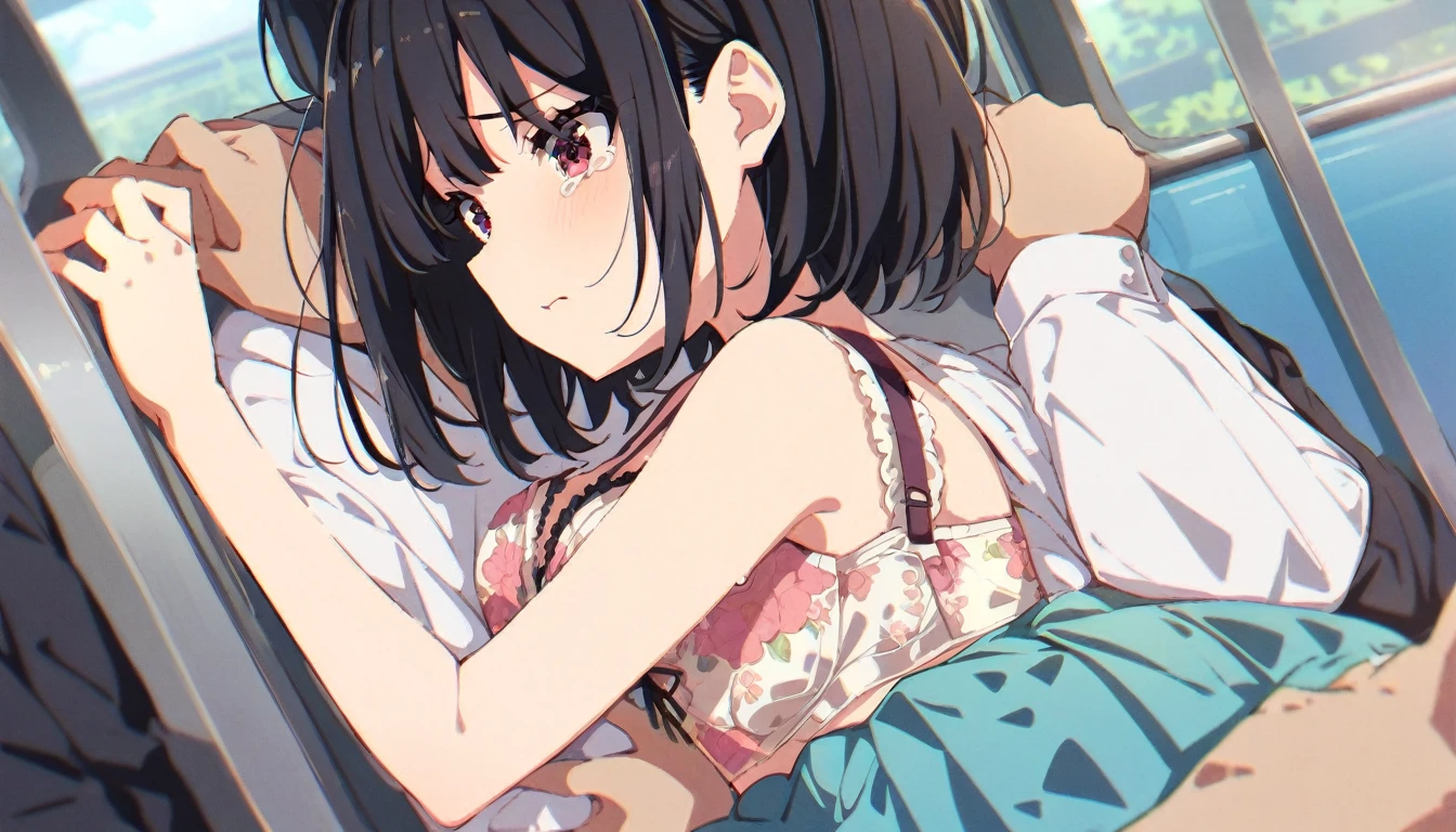 A girl with short black hair and small breasts is crying in disgust as a molester massages her breasts with both hands on a train. Her skirt and floral bra are hanging from her left arm.