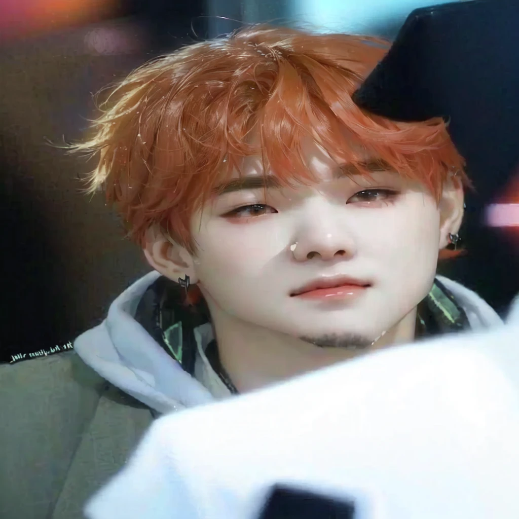 a close-up of a red-haired and hooded person, black haired yoongi, pale korean adorable face, Jimin\his right eyelid is swollen, young pale angel, ironic smile, hyung tae, hong june hyung, cute round slanted eyes, with round cheeks, looks like a human minion, smiling deviously, ten reads, Sugar BTS, Yoongi BTS, Min Yoongi, Sugar, BTS