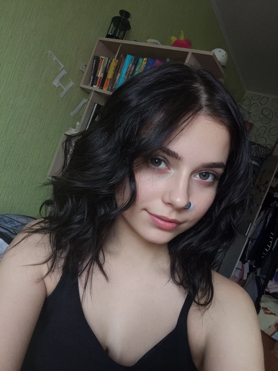 a selfie of a pretty young woman, taken with iphone camera