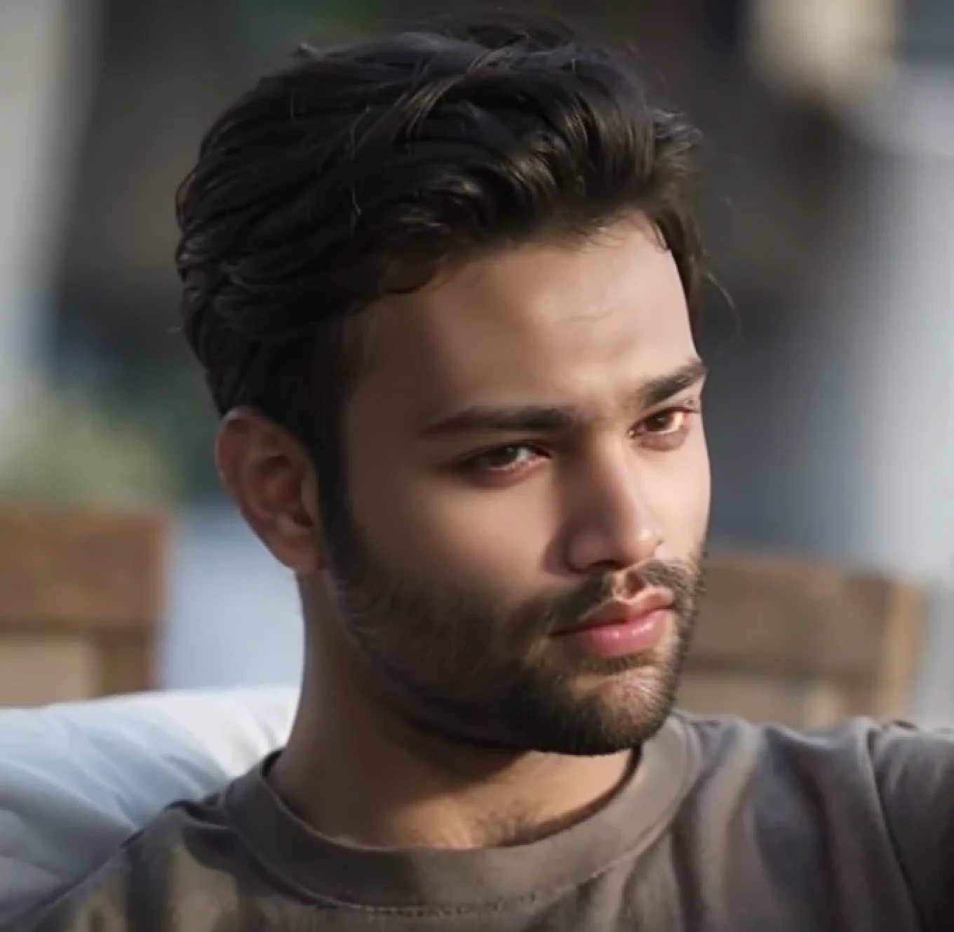 A beautiful young bearded man with highly detailed skin.black hair.