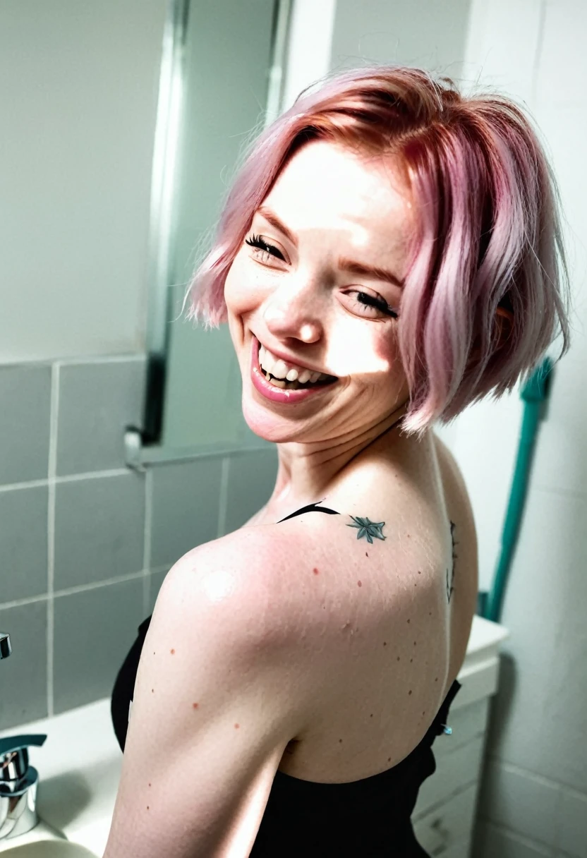 Short pink hair pale skin woman standing in bathroom laughing