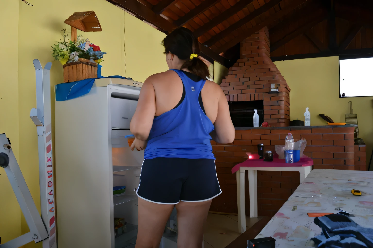 woman in blue tank top standing in front of a refrigerator, in shorts, in the kitchen, wearing a tank top and shorts, side shot, sport bra and dark blue shorts, cottagecore!! fitness body, photo 85mm, wearing a camisole and shorts, by Nándor Katona, malika favre, wearing : tanktop