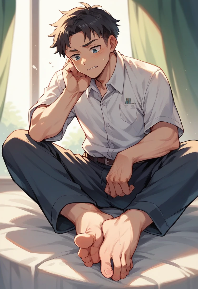  boy smelling own feet