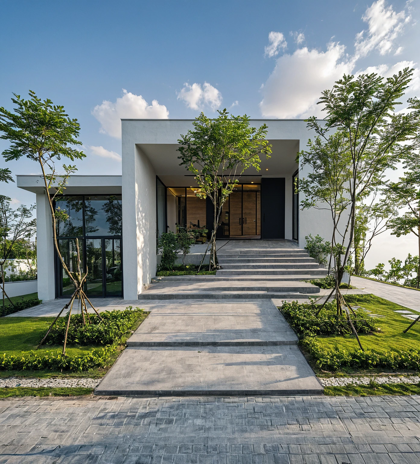 Masterpiece, high quality, best quality, authentic, super detail, outdoors, onestoreyvillaXL, aiaigroup, house style modern on the street ,stairs, white wall ,road,pavement, grass, trees, sky, cloud, (daylight:1.1)