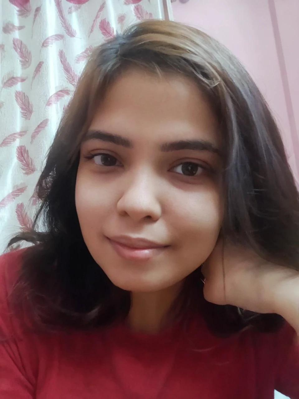 Pretty, indoor, brunette, mole on left side chin, smilling