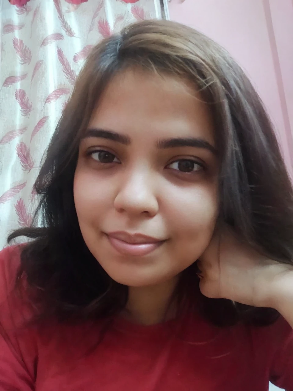 Pretty, indoor, brunette, mole on left side chin, smilling