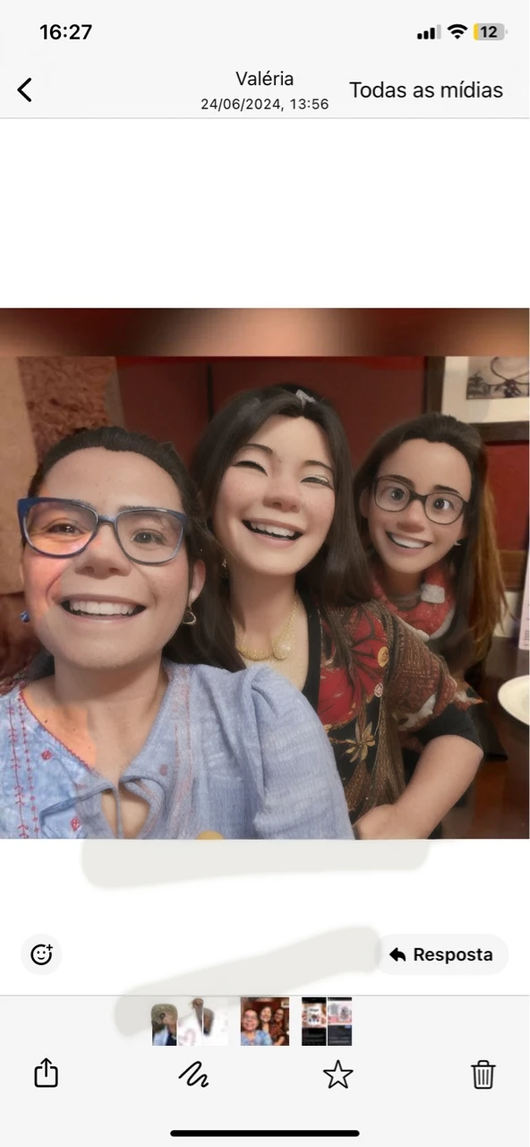 three friends smiling together in a photo