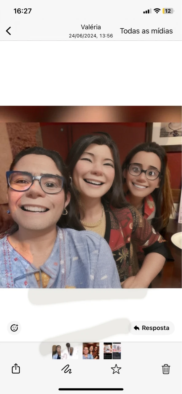 three friends smiling together in a photo