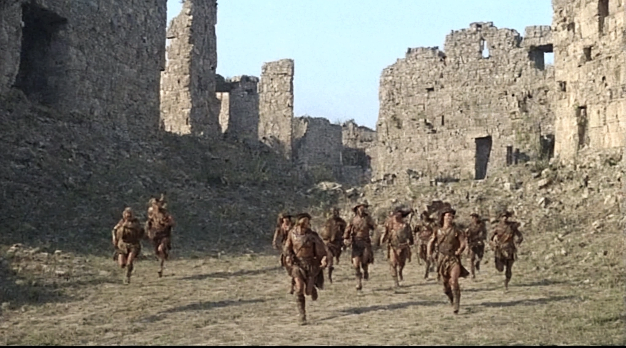 grainy old footage, 35mm vintage, frightened 18th century explorers running from two giant-spartan soldiers among ancient ruins