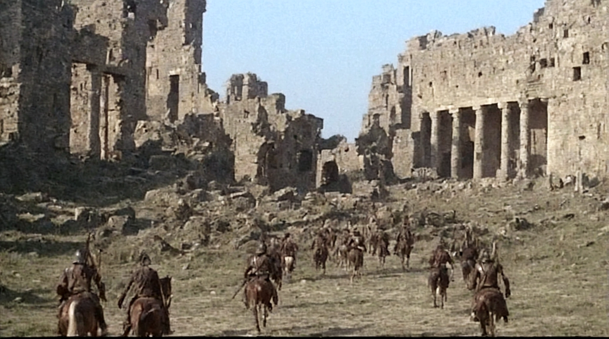 grainy old footage, 35mm vintage, frightened 18th century explorers running from two giant-spartan soldiers among ancient ruins