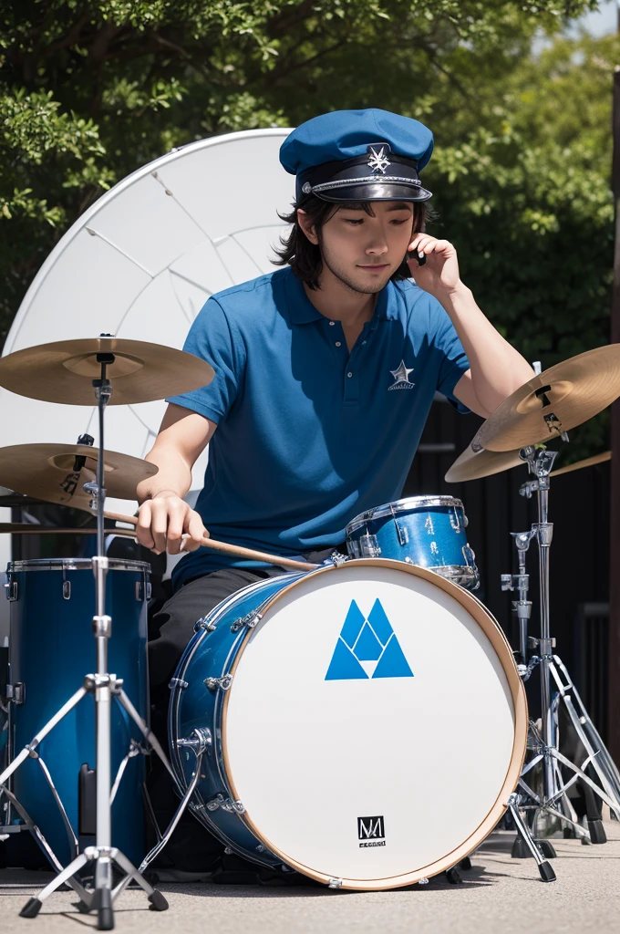 Drummer with white mercedez cap, sitting on the starry blue musical drum bench