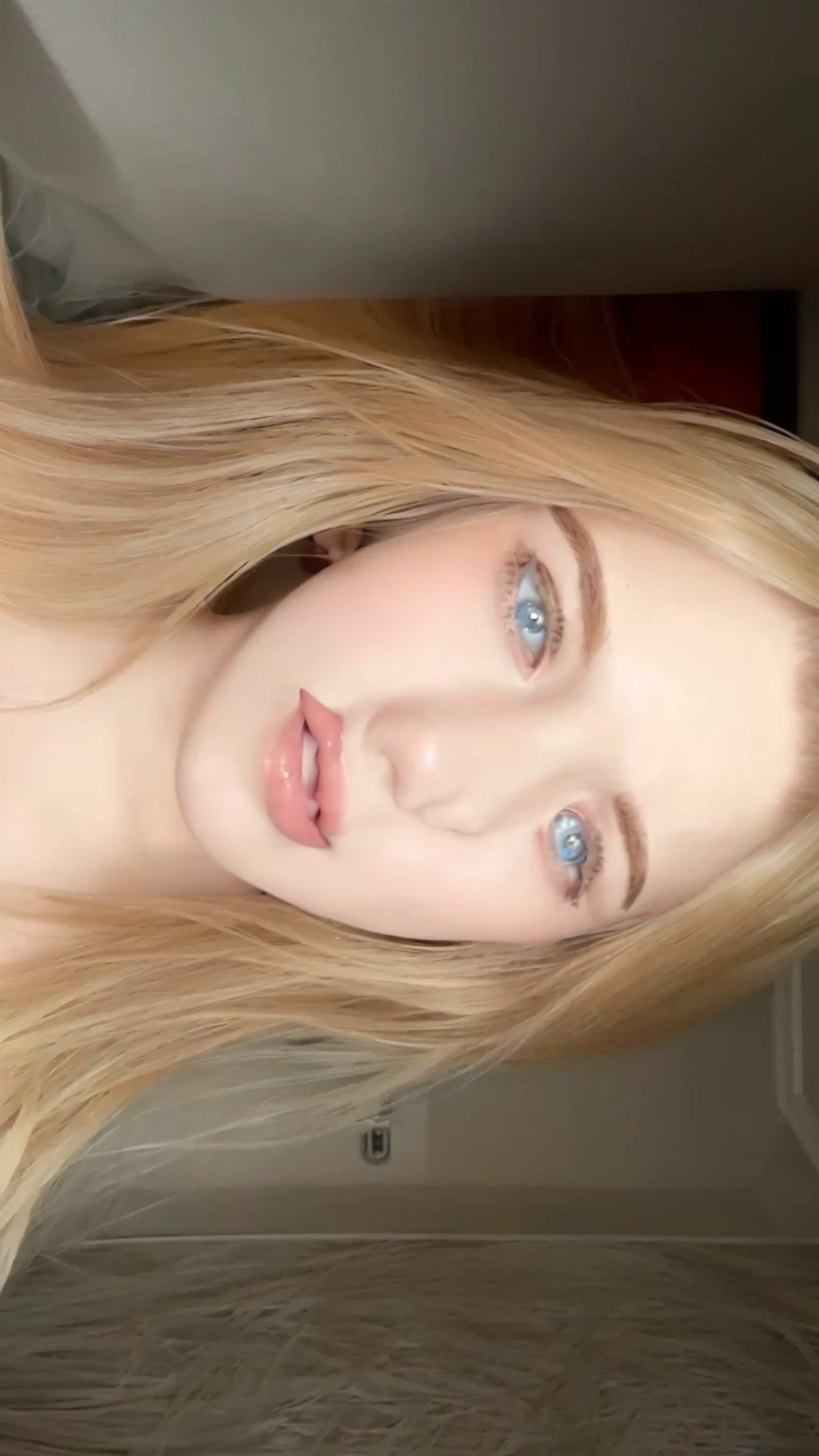 Blonde-haired woman with blue eyes and a white shirt, portrait of kim petras, Sophie Turner, smooth, pale, flawless skin, blonde hair and large eyes, long blonde hair and large eyes, blonde hair and blue eyes, pale and glowing skin, flawless detailed face, soft portrait photographed in 8k, blonde hair blue eyes, Sophie Turner girl, long blonde hair and blue eyes
