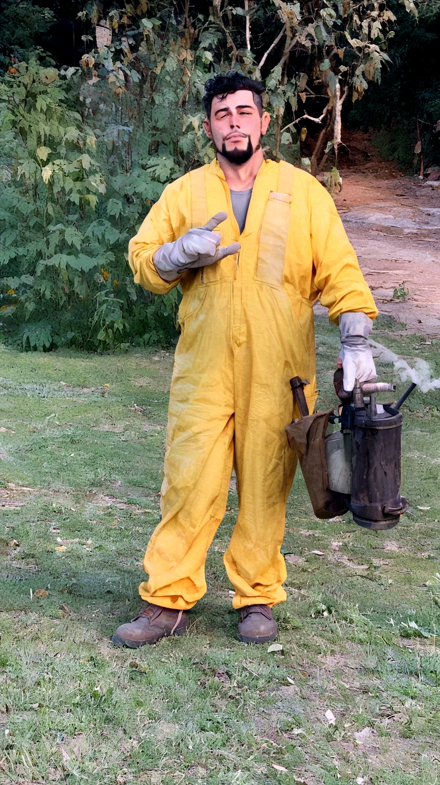 naughty man, Not too thin, black hair and goatee, dressed in yellow beekeeper overalls, drilling a beekeeping fumigator, making a horn sign with the right hand.
