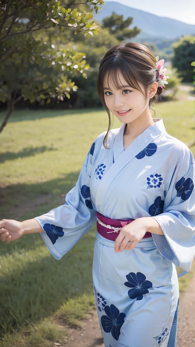 A beautiful girl in a yukata is dancing in the countryside