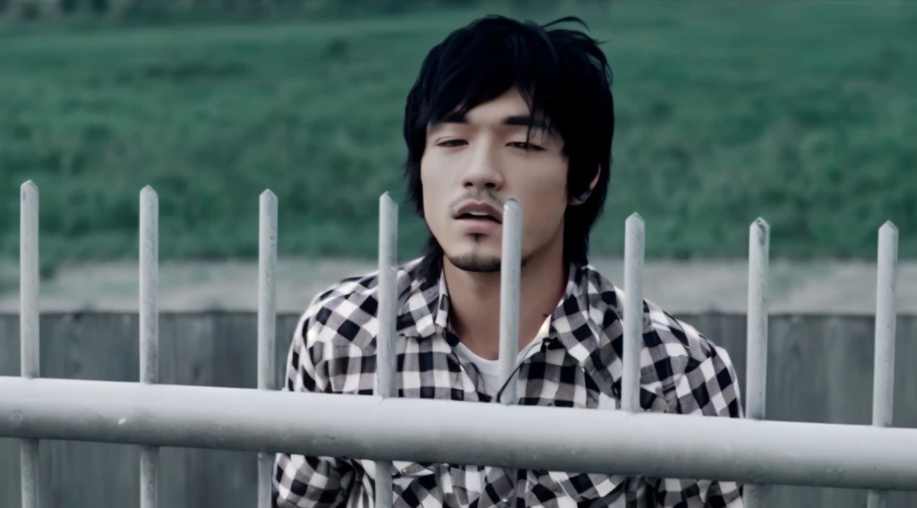 A man in a plaid shirt standing behind a fence, still from a music video, youtube video screenshot, high resolution, screenshot from a movie, High definition, music video, UHD, High quality, ultra sharp image, photo realistic