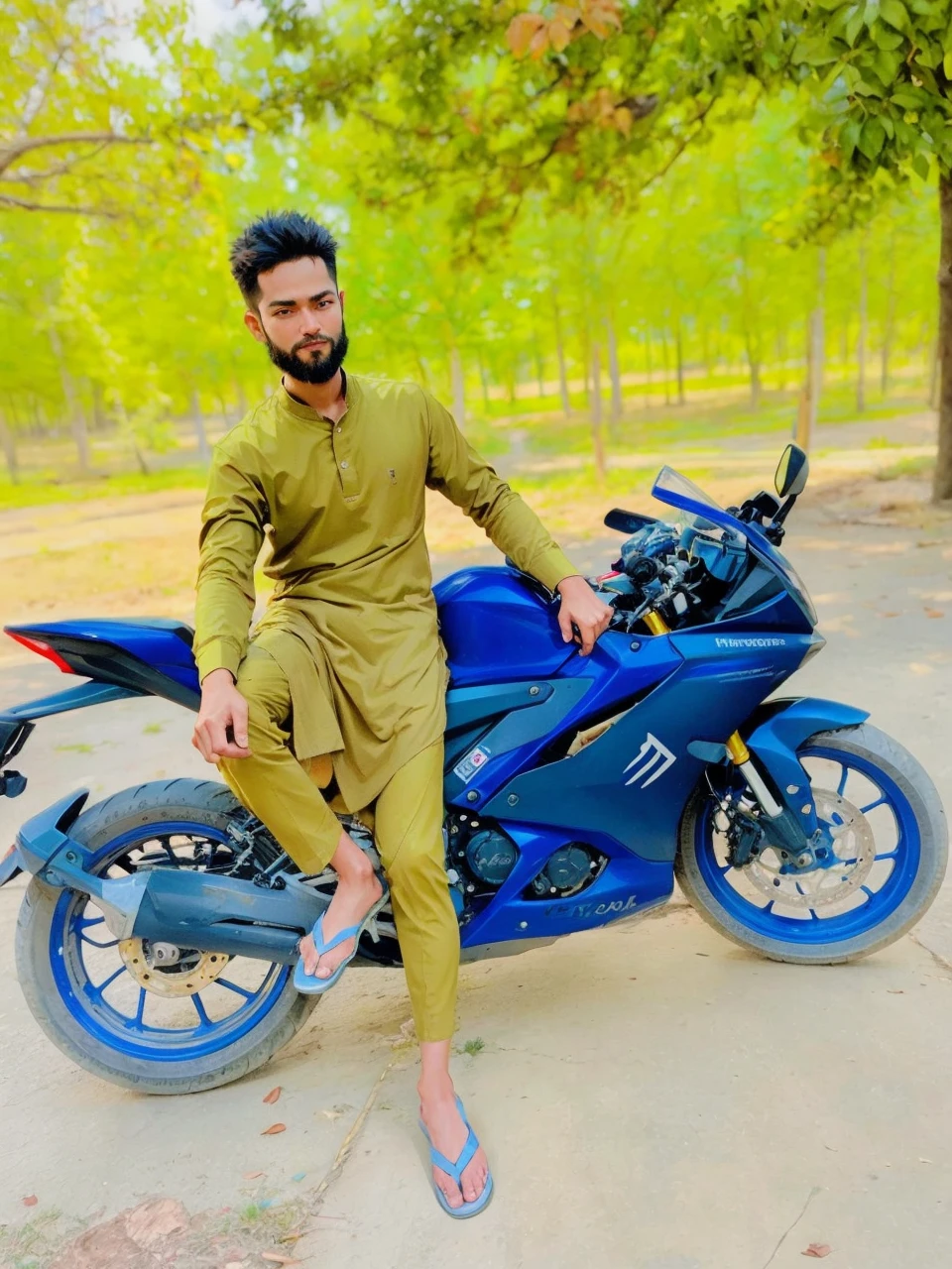 A boy sitting on a bike, the background natural, blur,