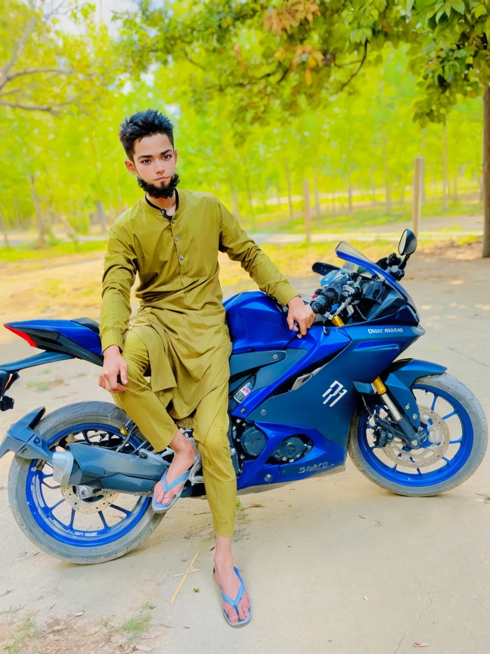 A boy sitting on a bike, the background natural, blur,