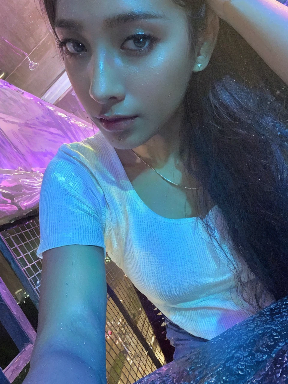 (Best quality, 4k, Masterpiece :1.3), pretty woman, 1girl, sexy :1.1, dark brown hair: 1.1, (waterfall, wet body :1.2), sexy white tank tops, ultra-detailed face, detailed lips, detailed eyes, double eyelid