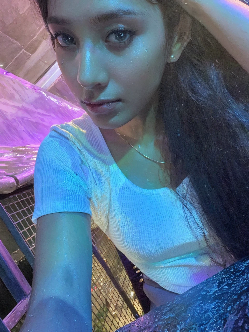 (Best quality, 4k, Masterpiece :1.3), pretty woman, 1girl, sexy :1.1, dark brown hair: 1.1, (waterfall, wet body :1.2), sexy white tank tops, ultra-detailed face, detailed lips, detailed eyes, double eyelid