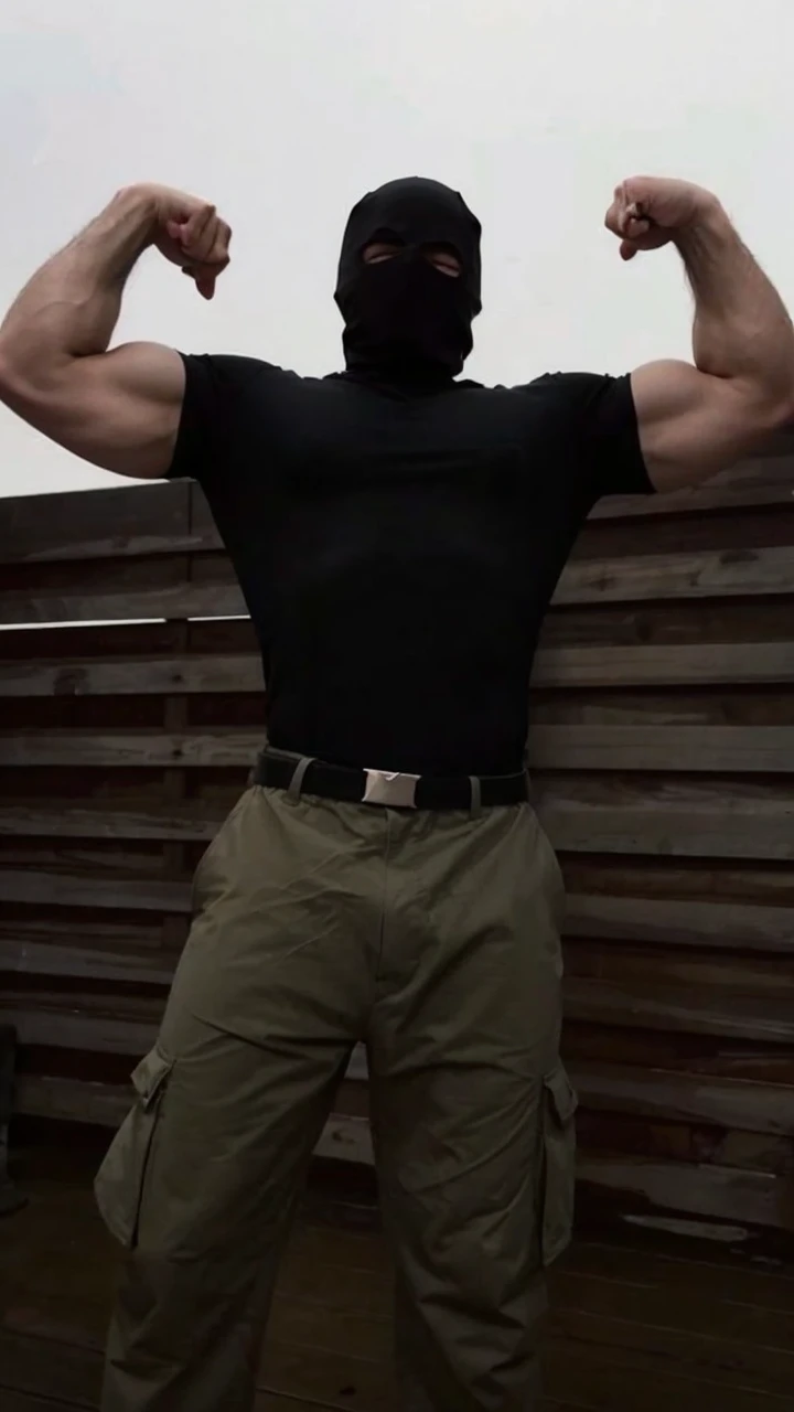 Robert Pattinson with black compression t-shirt in y2k style, masculine and muscular features, black hair and Batman tattoos