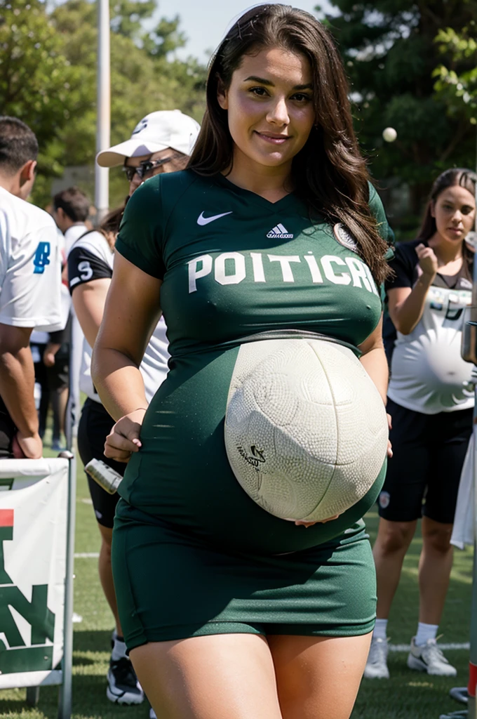 pregnant football player celebrating