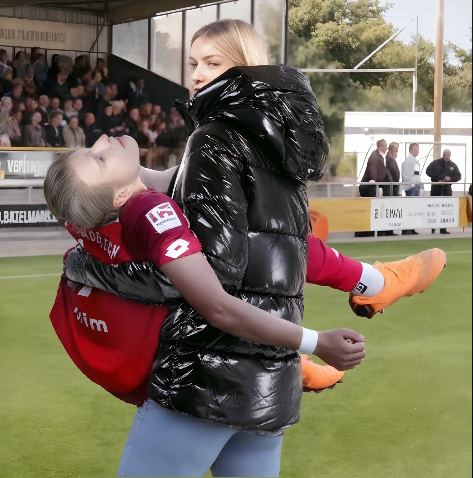 In the center of the picture stands with her back to us a blonde young woman in a very shiny black quilted coat, the woman in the black quilted coat stands on the playing field of a crowded sports hall, the woman in the shiny quilted coat turns her back to us and is holding a man in front of her in short and very dull sportswear in her arms, the blonde woman in the quilted coat carries an injured athlete away from us, to the left of the blonde woman's back you can see the athlete's male legs hanging over the woman's arm, to the right of the blonde woman's back you can see In profile you can see the upper body and head of the injured man whose gaze is distorted in pain and directed upwards towards the ceiling, the athlete's husband on the right grabs the blonde woman's shoulder with his arm, very painful scene, sports injury, severe pain, a woman is carrying one man on the arm, a man is injured and has to be carried, compassion, photo, ultra-realistic shot, sports photography