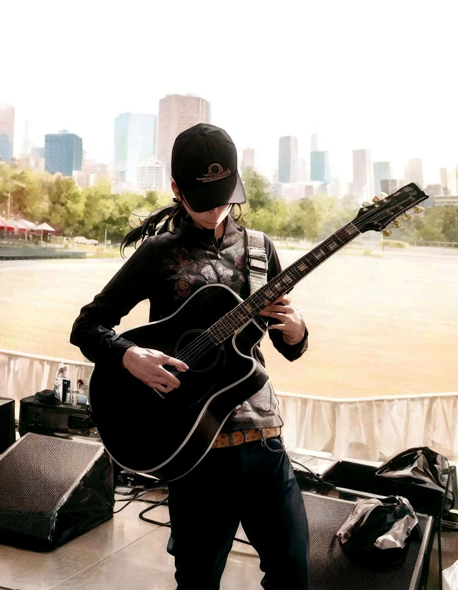 there is a man that is playing a guitar on stage, playing the guitar en el escenario, running, running on stage, Ed O'Brien (guitar), singer-songwriter, zac retz, Live at Lollapalooza, on a stage, tom morello, with a city in the background, playing the guitar, playing a guitar, Jay Bauman, Bryan Sola