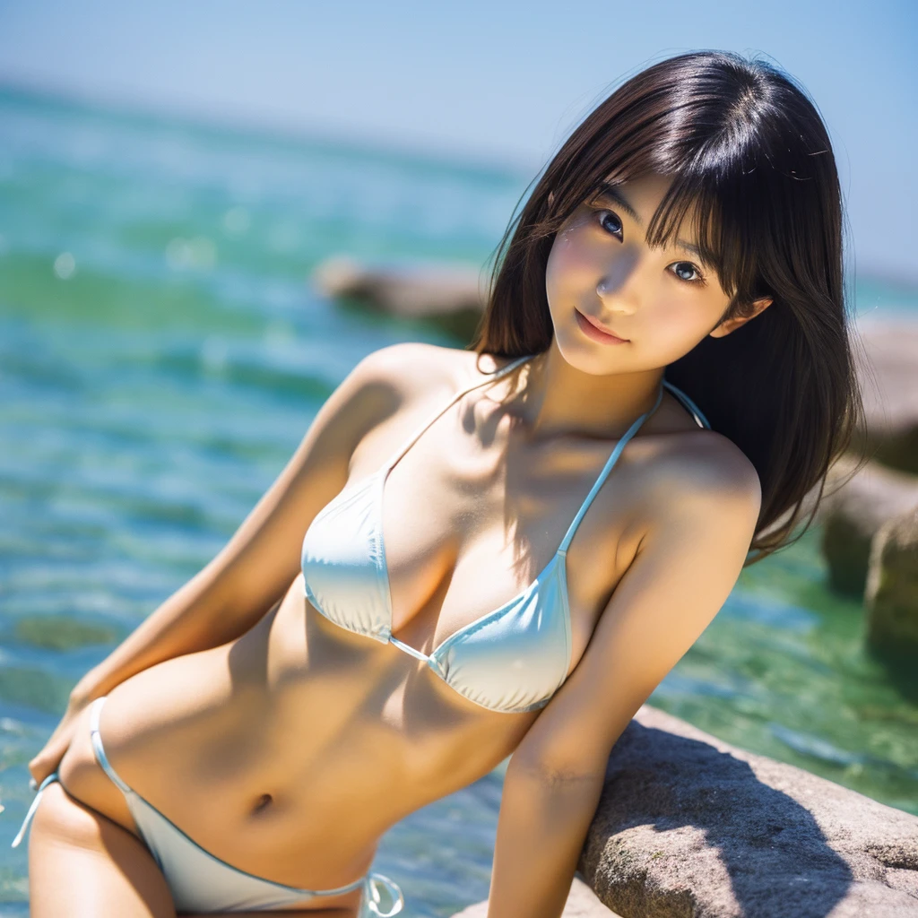 A beautiful Japanese woman in her early s wearing a high-cut bikini