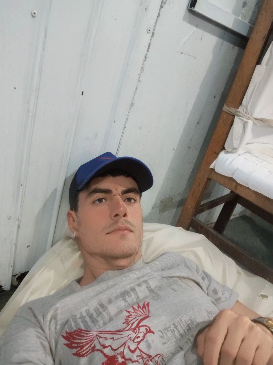 (masterpiece, best quality:1.2), 1boy, solo, A youthful individual with a pronounced jawline, intense black eyes behind black-framed glasses, and an air of fatigue. Their black hair is unkempt, leaning to the right, complementing their full-body stance. clad in a crisp white shirt and navy-blue trousers, captured in the styles of 'studioghibli' and 'Shingeki no Kyojin S4'.